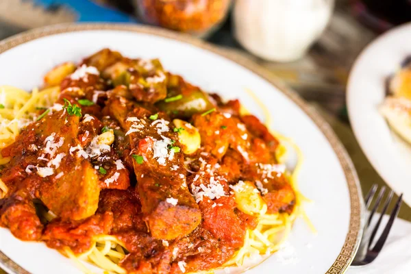 Fresh spaghetti with sausage — Stock Photo, Image