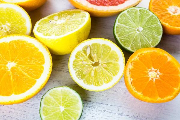 Sliced fresh citrus fruits — Stock Photo, Image