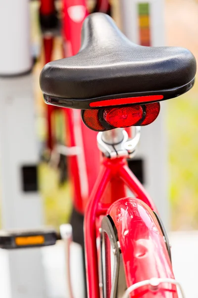 Row of red rental bikes — Stock Photo, Image