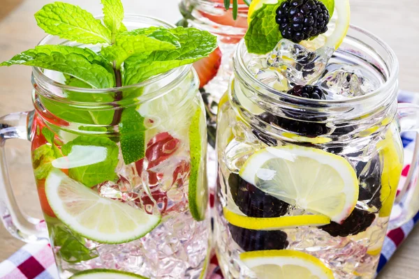 Water made with organic citruses and berries — Stock Photo, Image