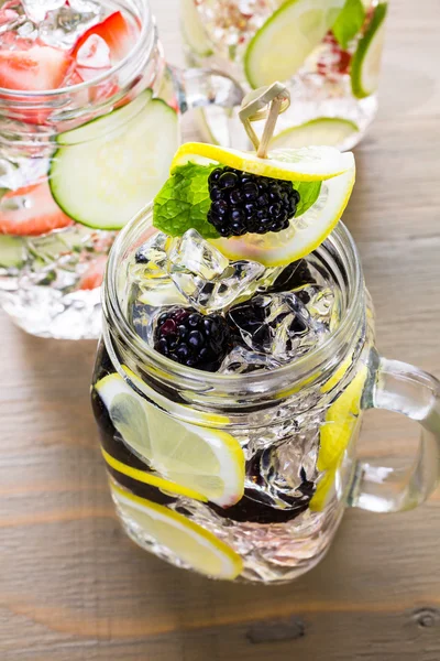 Water made with organic citruses and berries — Stock Photo, Image