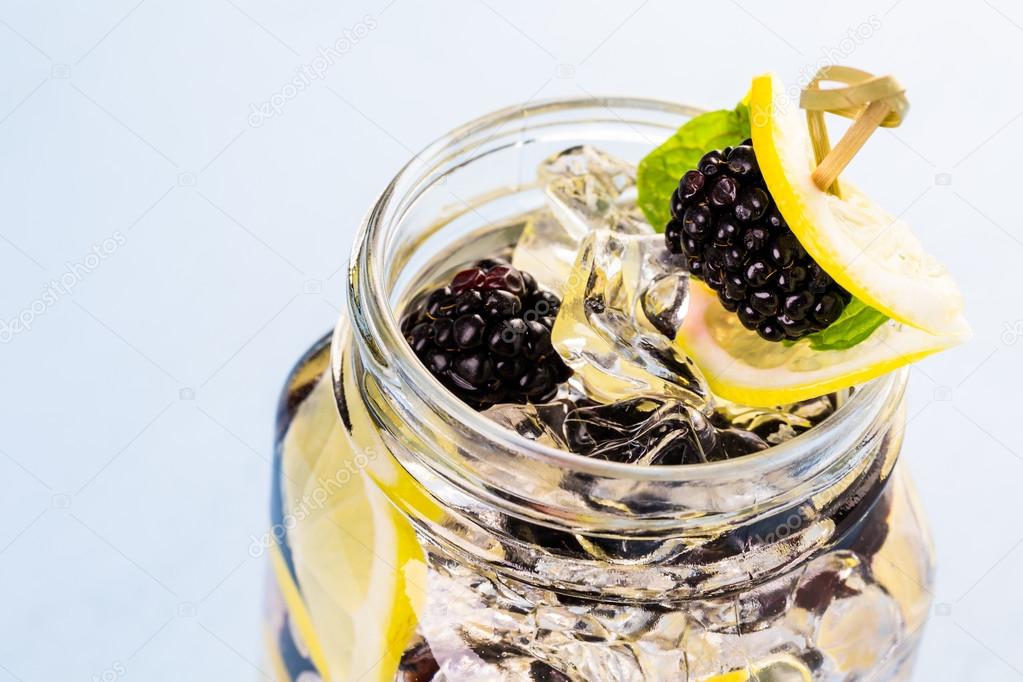 Water made with organic citruses and berries