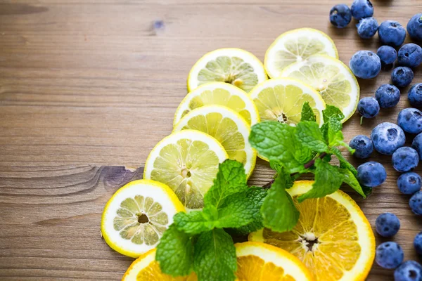 Sliced fresh organic fruits — Stock Photo, Image