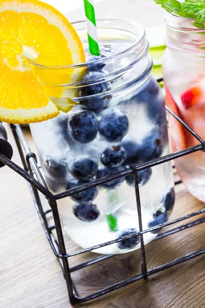 Infused water with fresh berries. — Stock Photo, Image