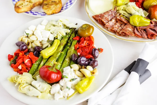 Appetizers plate with vegetarian antipasto — Stock Photo, Image