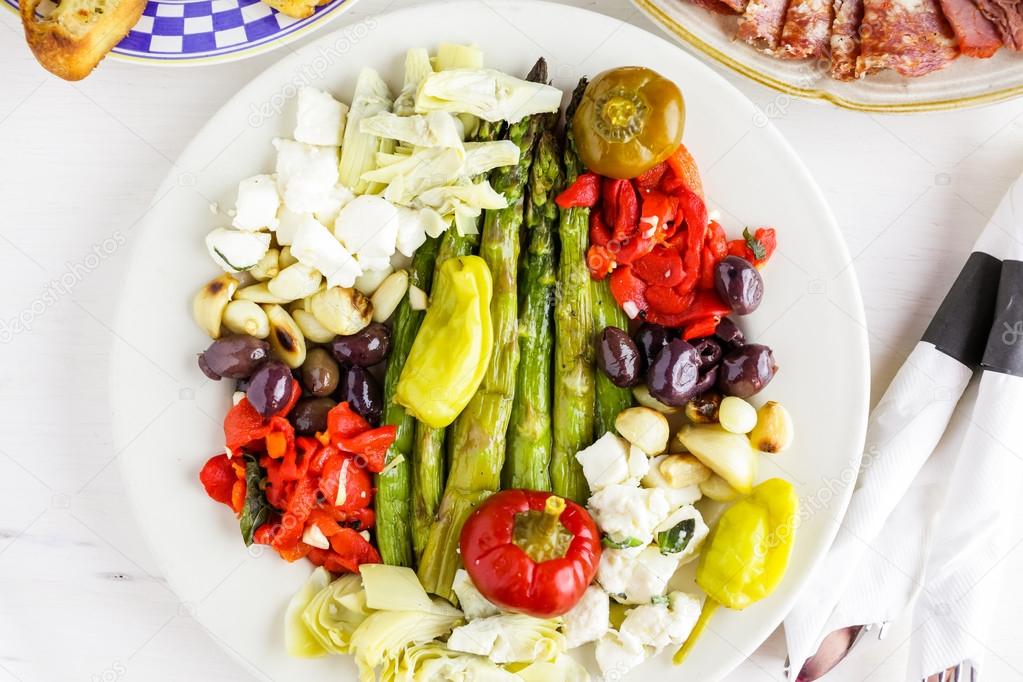 Appetizers plate with vegetarian antipasto — Stock Photo