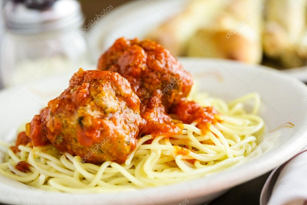 Spaghetti with meatballs on the plate