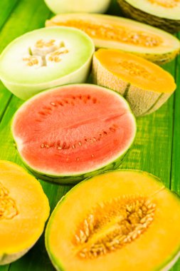 Variety of organic melons sliced