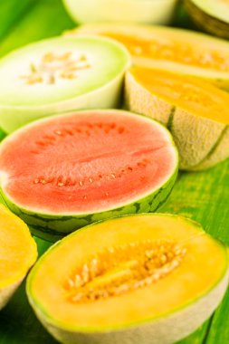 Variety of organic melons sliced