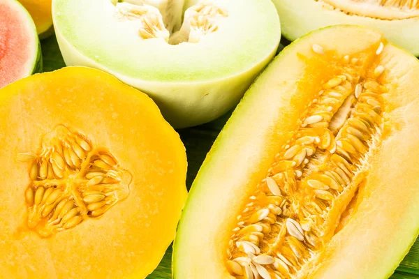 Variety of organic melons sliced — 스톡 사진