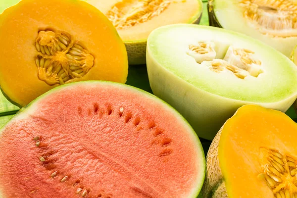 Variety of organic melons sliced — ストック写真