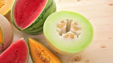 Variety of organic melons sliced