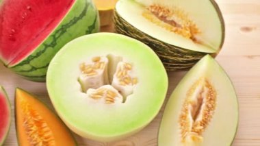 Variety of organic melons sliced