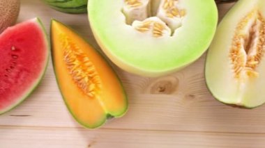 Variety of organic melons sliced