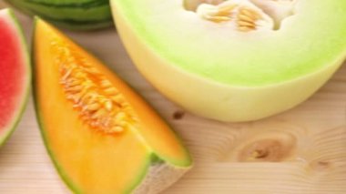 Variety of organic melons sliced