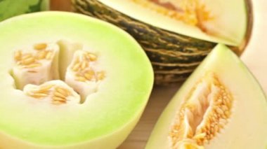 Variety of organic melons sliced