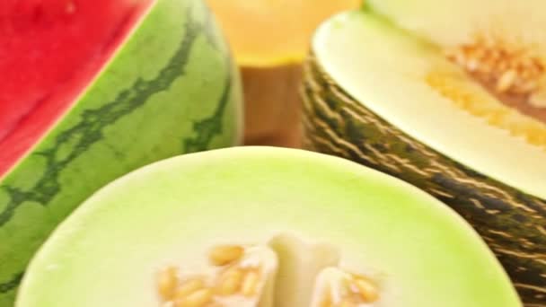 Variety of organic melons sliced — Stock Video