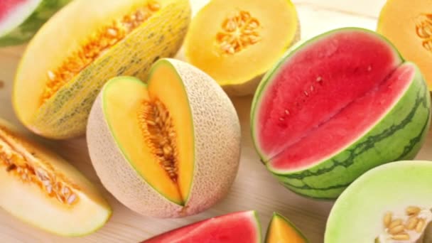 Variety of organic melons sliced — ストック動画