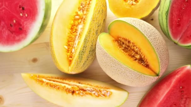 Variety of organic melons sliced — Stock Video