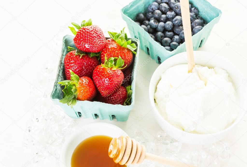 Ingredients for smoothie with plain yogurt and berries