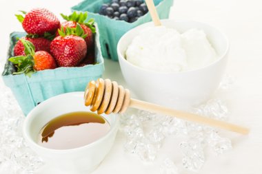Ingredients for smoothie with plain yogurt and berries