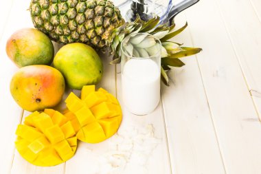 ingredients for smoothie with tropical fruits.