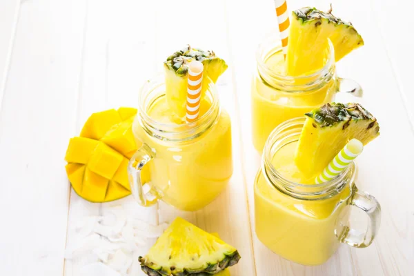 Homemade mango and pineapple smoothies