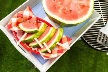 Yummy watermelon slice popsicles clipart