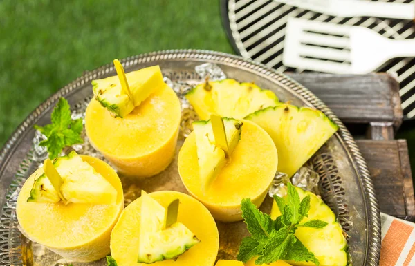 Popsicles made with mango, pineapple and coconut milk — Stock Photo, Image