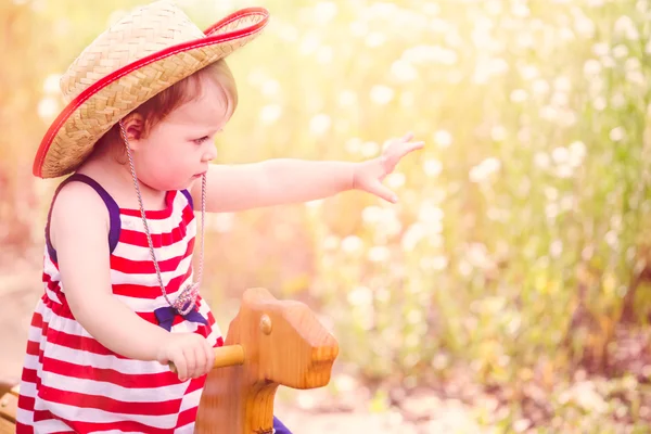 Toddler girl having fun in the park — Stok fotoğraf
