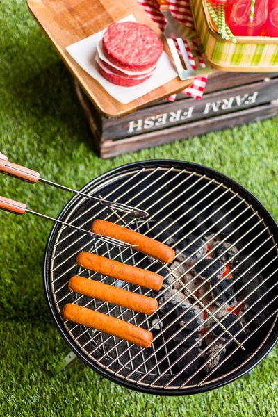 Summer picnic with small charcoal grill — Stock Photo, Image