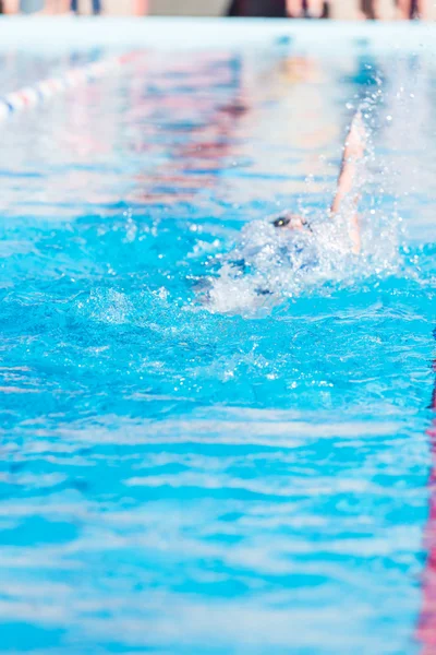 Kids swim meet in outdoor pool — Stock Photo, Image