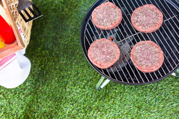 Summer picnic, hamburger patties — Stock Photo, Image