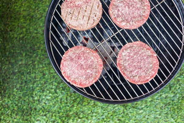 Summer picnic, hamburger patties — Stock Photo, Image