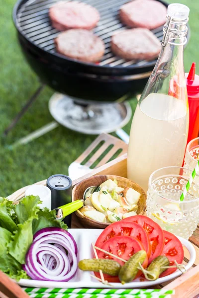 Small summer picnic with lemonade and corn — Stock Photo, Image