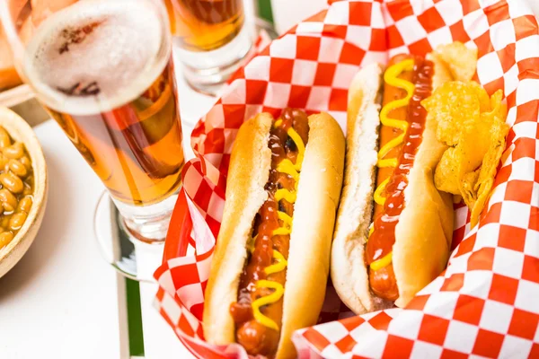 Grilled hot dogs with mustard and ketchup — Stock Photo, Image