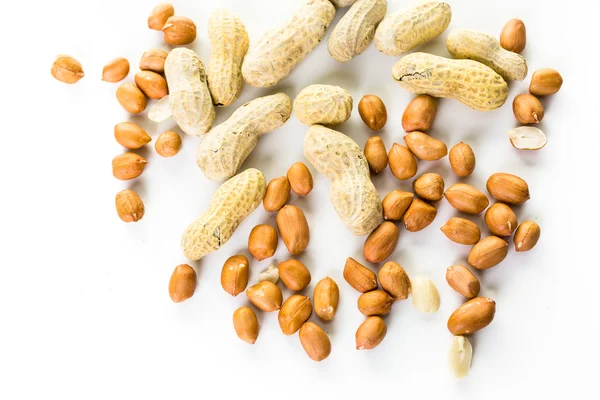 Amendoins descascados e em conchas — Fotografia de Stock