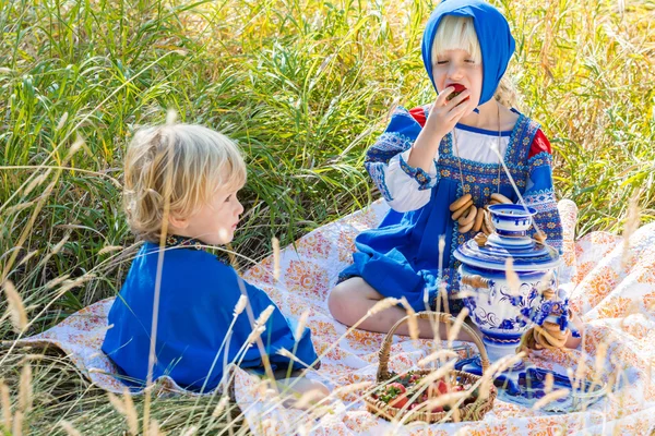 Little kids in Russian costumes — Stock Photo, Image