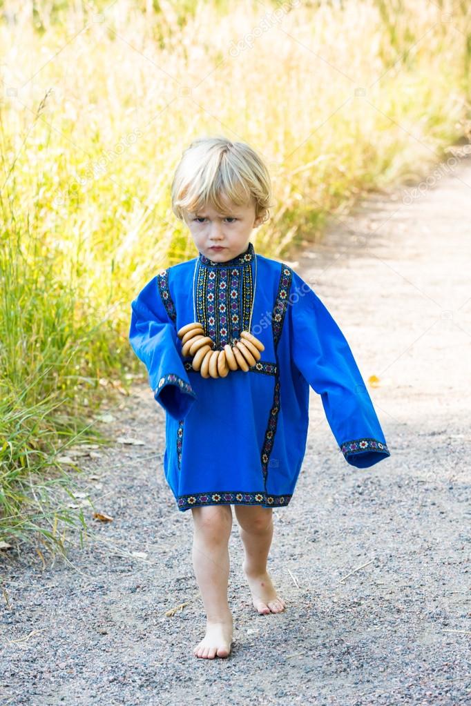 little boy in Russian costume