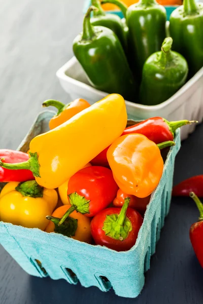 Organic Peppers on table — Stock Photo, Image