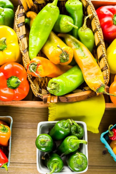 Organic Peppers on table — Stock Photo, Image