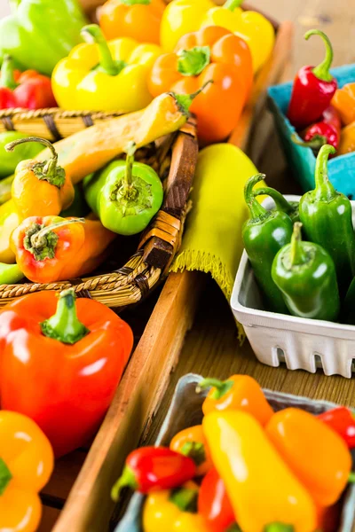 Organic Peppers on table — Stock Photo, Image