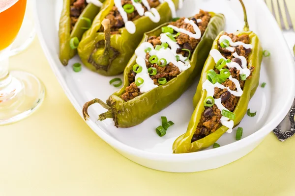 Chipotle beef and bean stuffed chile peppers — Stok Foto