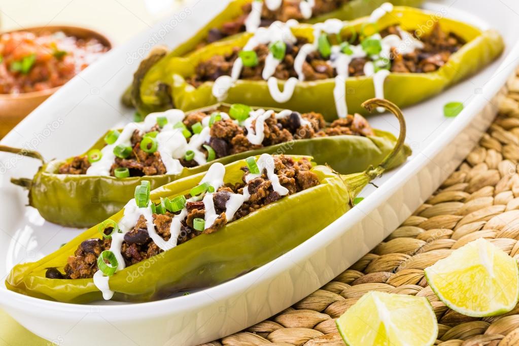 Chipotle beef and bean stuffed chile peppers