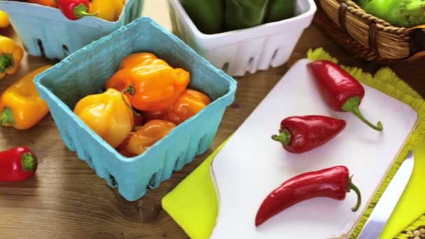 Organic peppers on the table — Stock Video