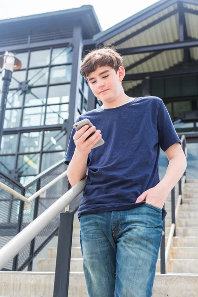 Teenage boy at the lightrail station — Stock Photo, Image