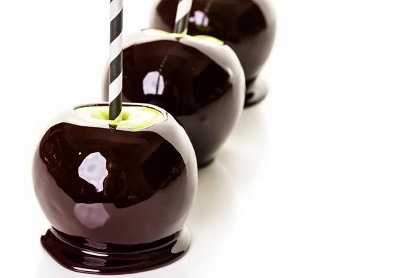 Black candy apples — Stock Photo, Image