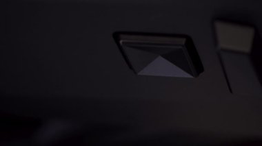 Denver, Colorado, USA-May 5, 2024-This image captures a close-up view of the seat adjustment buttons located in the Tesla Cybertruck, emphasizing the minimalist and sleek design of the vehicles