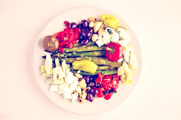 Appetizers plate with vegetarian antipasto — Stock Photo, Image