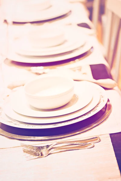Table set with plates — Stock Photo, Image
